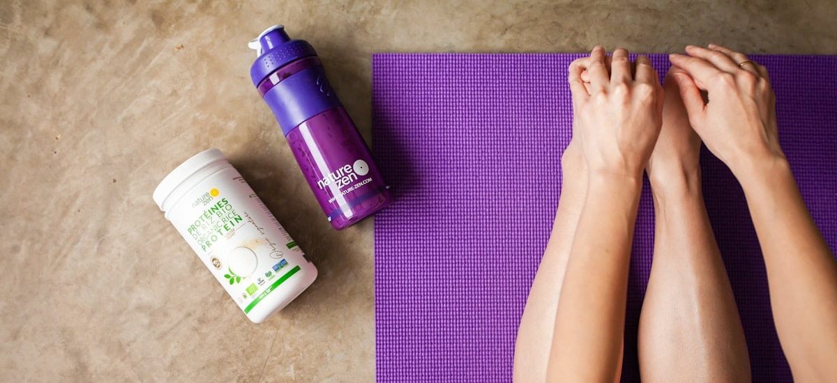 purple and white plastic bottle